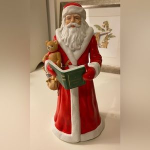 Santa Clause music box with “we wish you a merry Christmas” song, on- off lever.